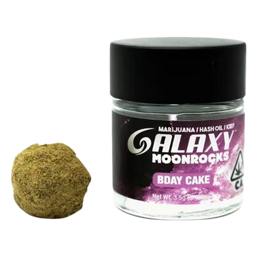 Container of HLAXV Moonrocks Bday Cake with a moonrock nugget beside it.