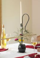 Black granite wine chime toasting bar on straight table. Holiday centerpiece, table decoration.