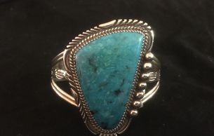 A natural-shaped blue gem turquoise cuff