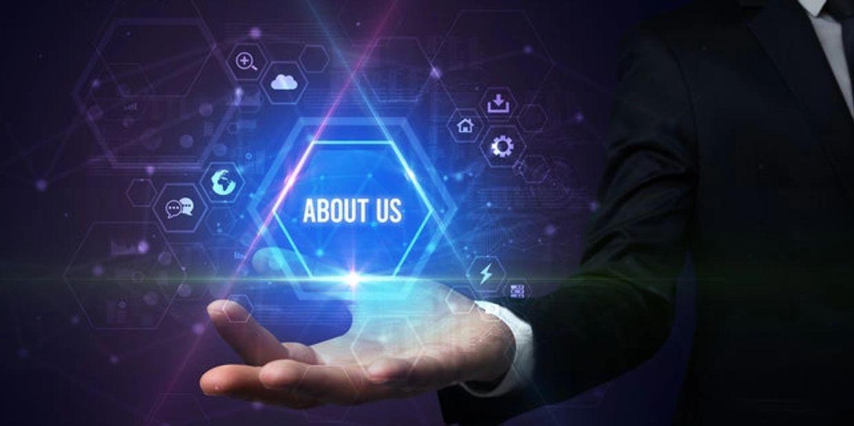 Businessman presenting a glowing 'About Us' digital interface with icons.