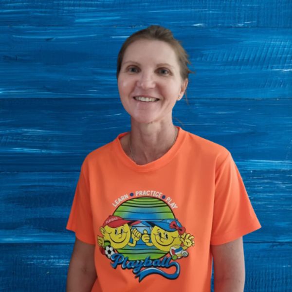 Photo of the playball fearie Glen owner and coach Linda van Heerden wearing orange playball shirt