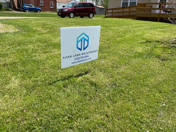 Titan Lawn Maintenance Sign Board in the Lawn 