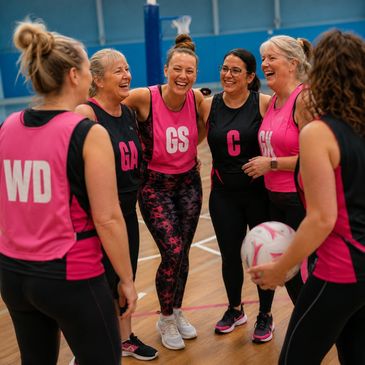 A netball women huddling
