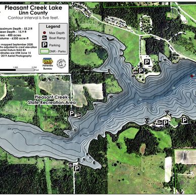 A detailed contour map of Pleasant Creek Lake showing depth and recreational areas.