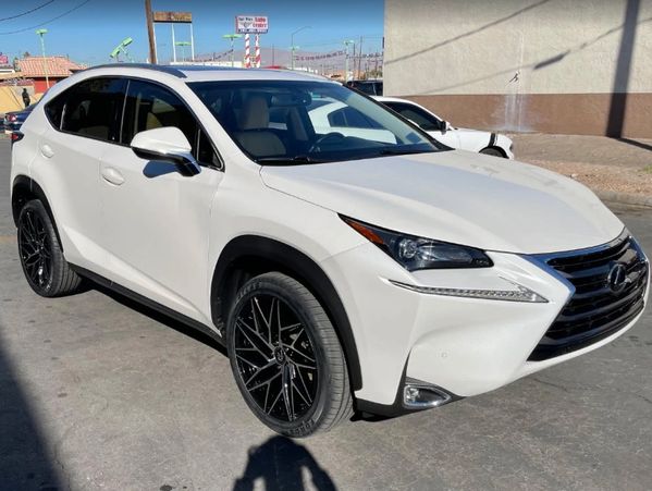Well-maintained SUV parked outside auto shop