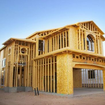 Wooden frame of a house under construction.