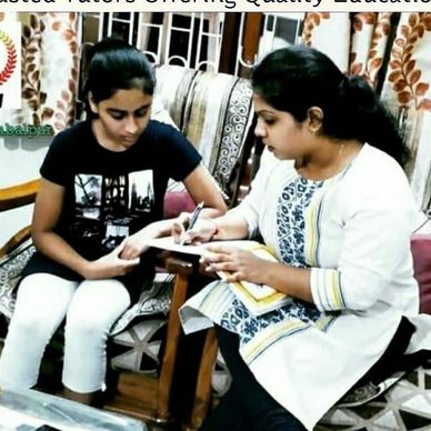 Tutor with Student During her working time 
Home Tutor Private Tutors Teacher Bhopal 
Lady Tutor 