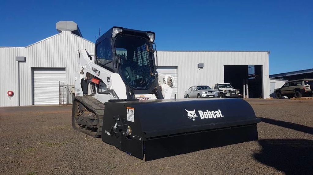 Bobcat with sweeper attachment