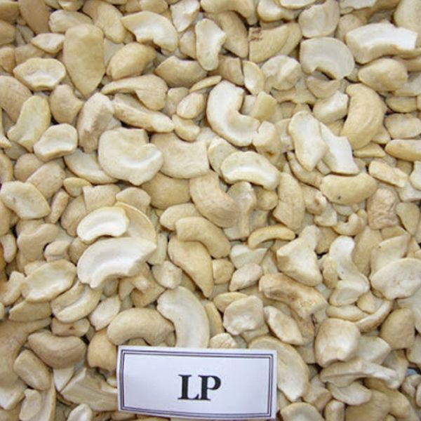 Close-up of shelled cashew nuts labeled LP.