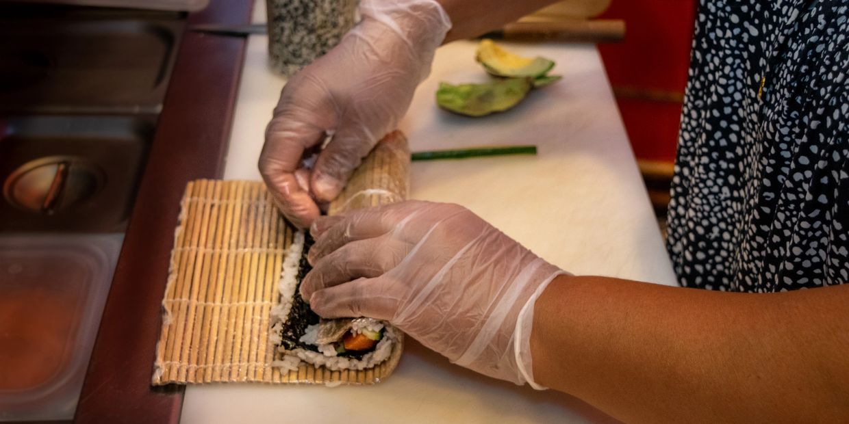 staff is making sushi