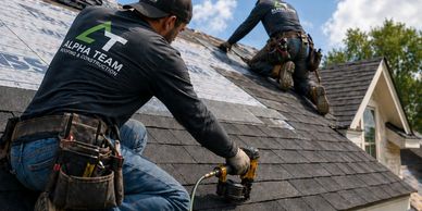 Worker installing a new roof