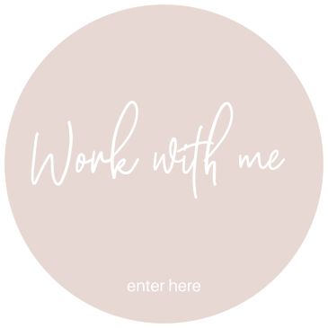 Circular beige sign with 'Work with me' text.