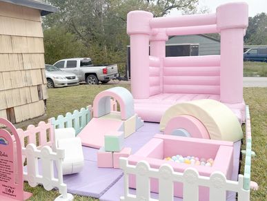 this image depicts a play area set up for a child’s birthday party.