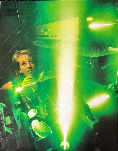 Carole [Curley], the leader of Keck Mirror test team, uses lasers to probe a mirror for defects.  