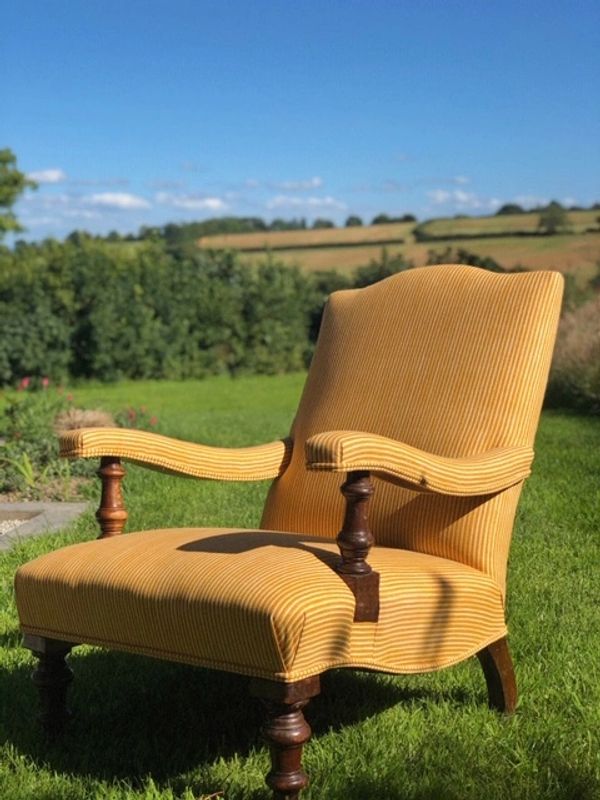 Antique Armchair upholstered in Fermoie