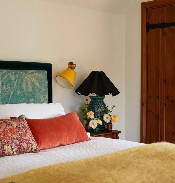 Bespoke Velvet and Fermoie Linen Headboard. Image from Coal Cornwall