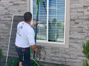 image of residential routine cleaning done with water fed pole WFP