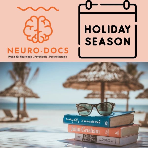 Books and sunglasses on a beach table during holiday season at Neuro-Docs.