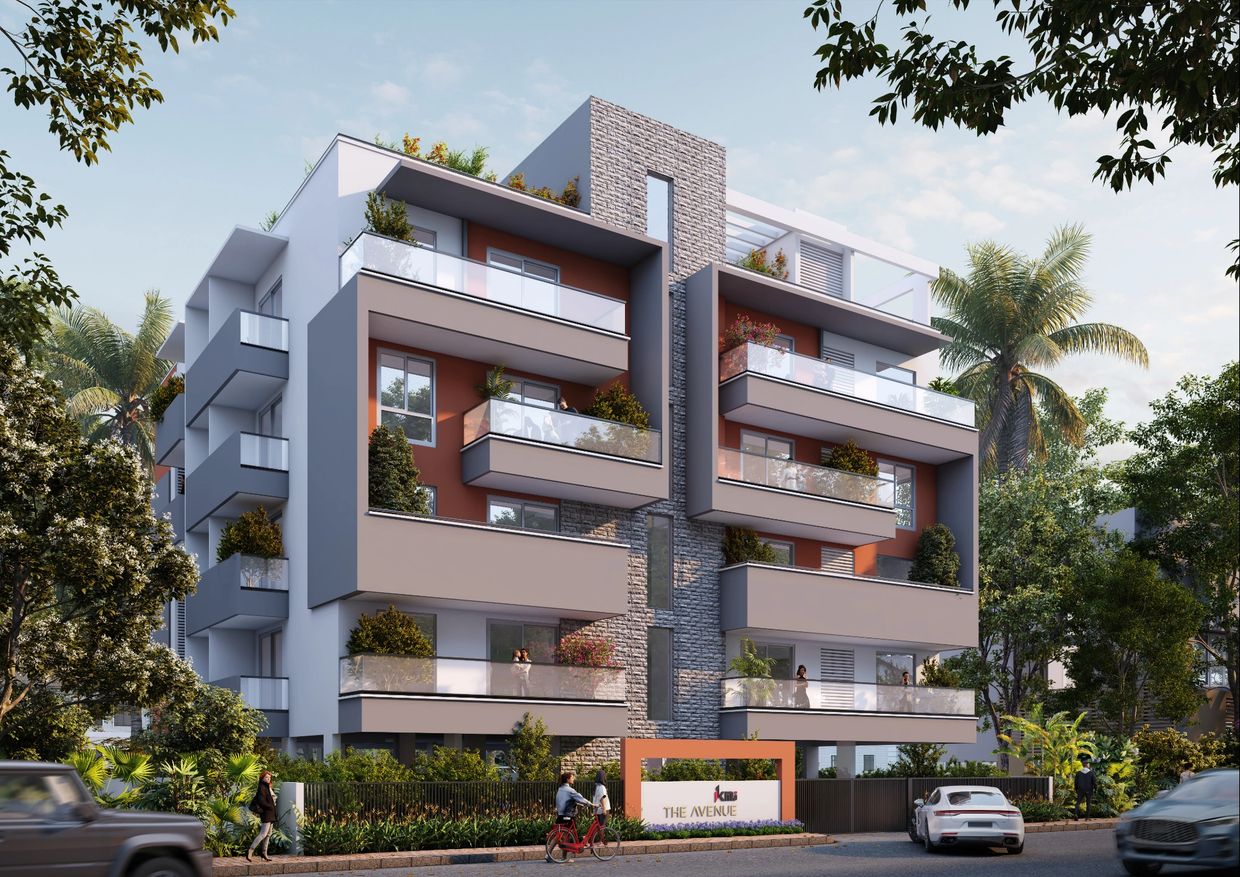 Modern apartment building with balconies and greenery.