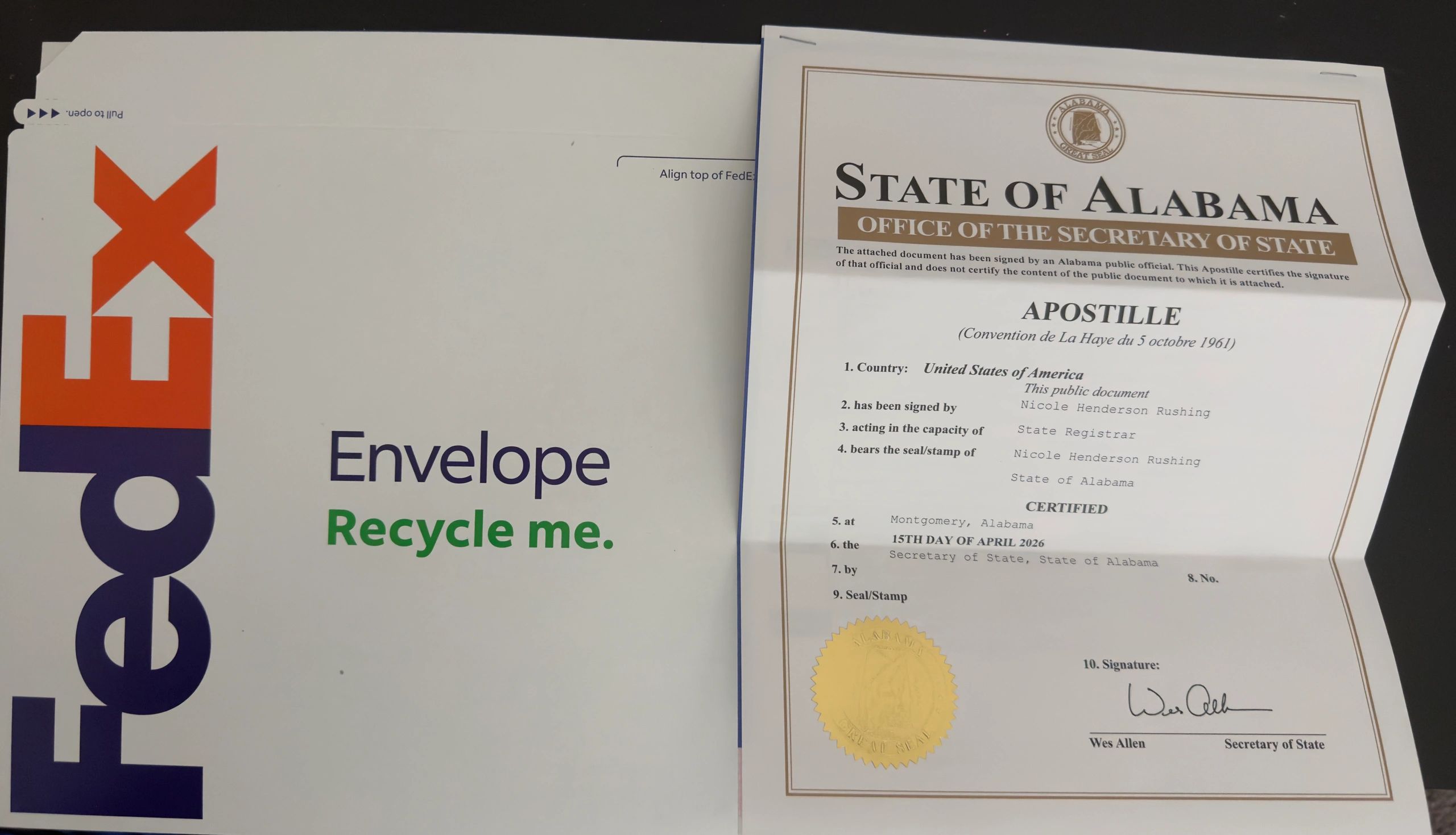 Completed Alabama birth certificate apostille ready for international shipping