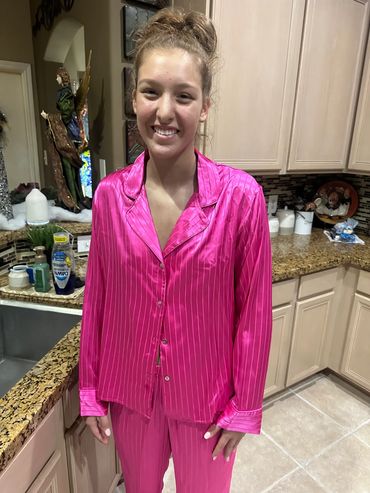 Quinceanera developing right after her custom spray tan at Sunless Tanz Beauty Bar in Katy, Texas. 