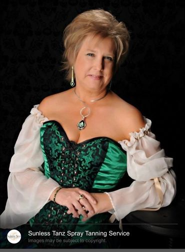 Sunless Tanz airbrush spray tanning client in Katy, TX wearing her renaissance custom.