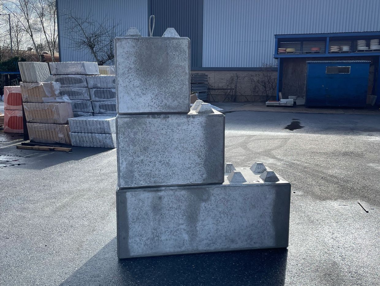 Concrete Interlocking Blocks stacked in 3 sizes