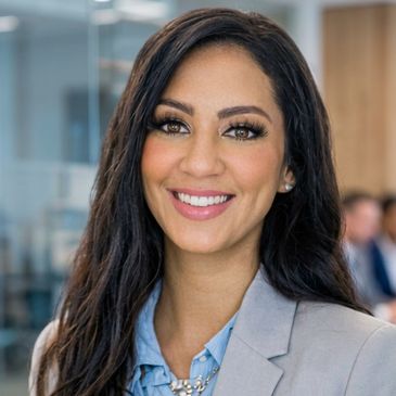 Professional woman smiling confidently.