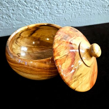 Wooden lidded bowl with beautiful grain patterns.