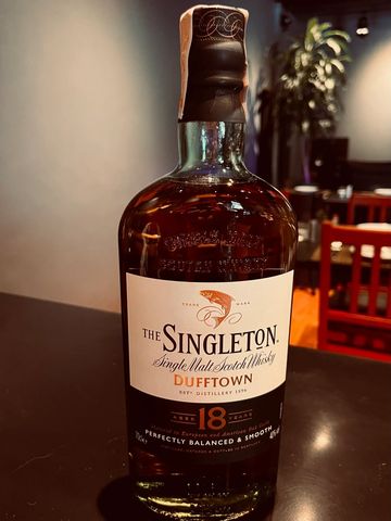 A bottle of The Singleton Dufftown 18-year single malt Scotch whisky.