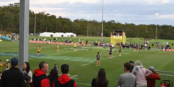 major touch football events going and spectators watching cheerfully