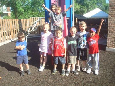 Children's Creative Corner Daycare children playing in their playground in Naperville Illinois