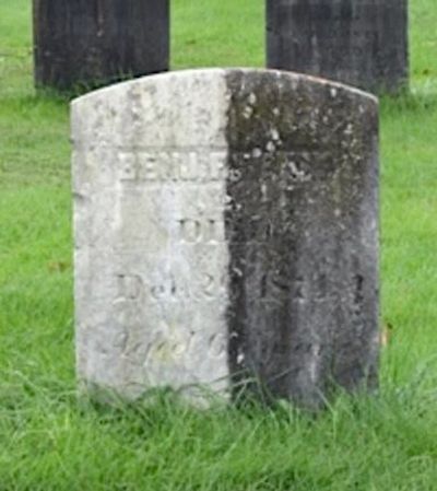 Half cleaned old headstone marker