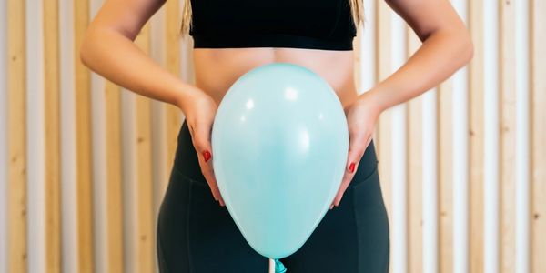 Woman holding balloon