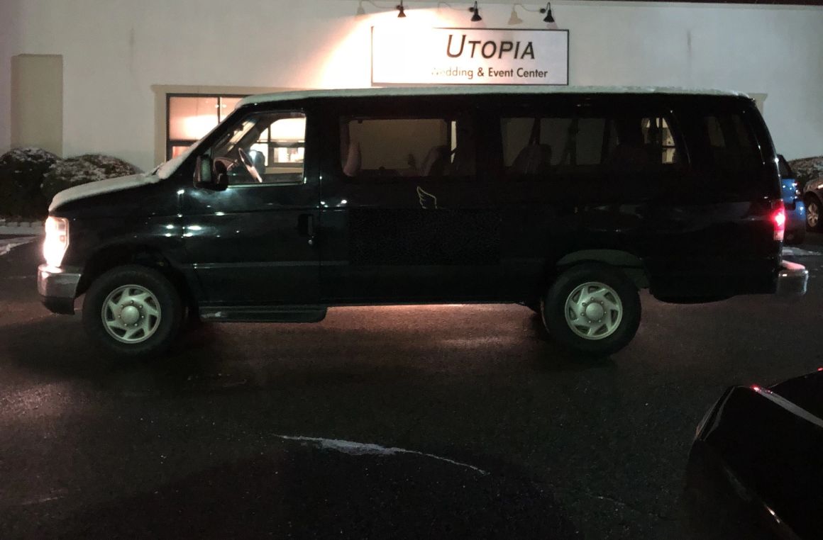 15 Passenger Ford Van 1