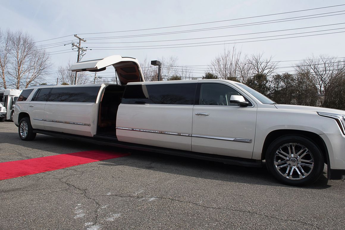 16 Passenger Escalade 1