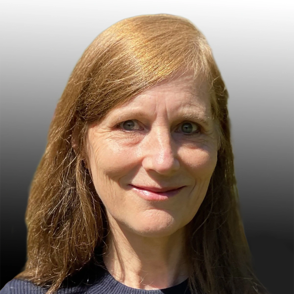 Portrait of children's book author Emily Arons smiling outdoors, with shoulder-length light brown hair.