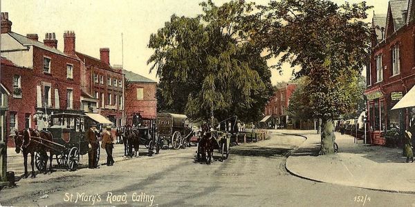 Vintage street scene on St. Mary's Road, Ealing, with horse-drawn carriages and brick buildings.