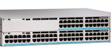 Two stacked network switches with multiple Ethernet ports.