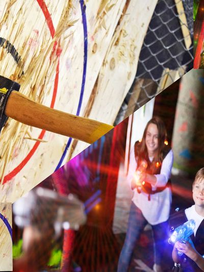 An axe stuck in a wooden target with colored rings.