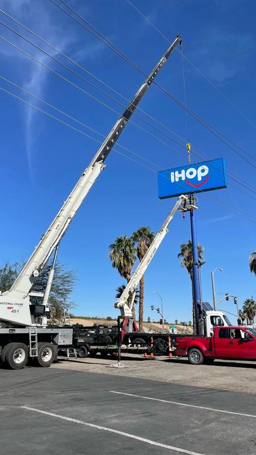 45 ton crane placing new IHOP sign.