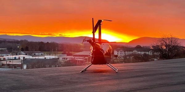 Sunset R44 helicopter