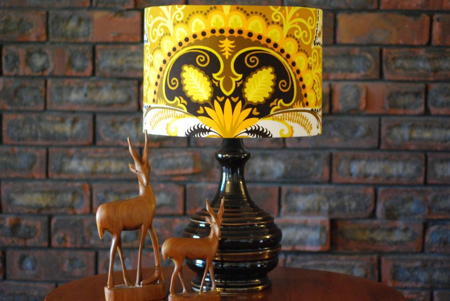 Vintage lamp and designer home decor pieces.