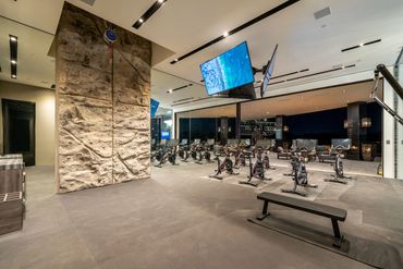 gym with rock climbing wall