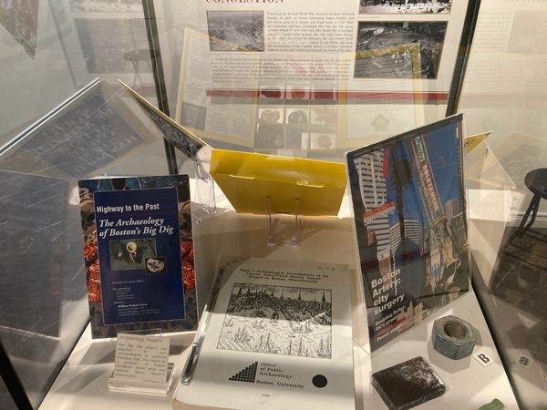 Artifacts and publications on Boston's archaeological digs.