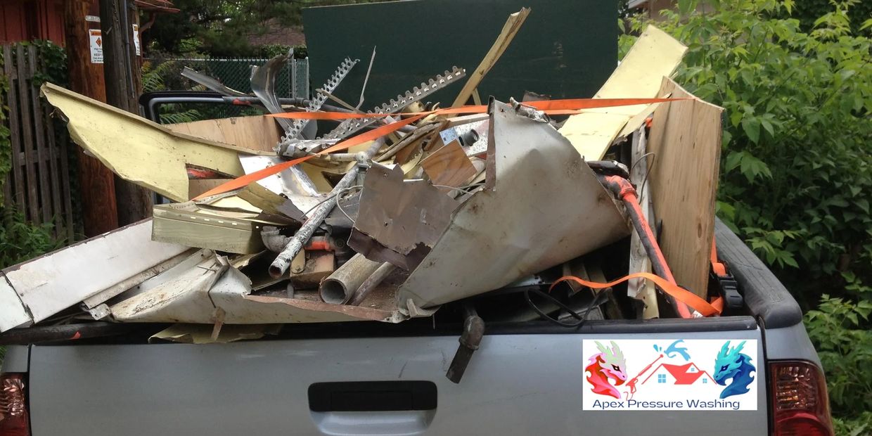 Loading junk and debris into the truck.
