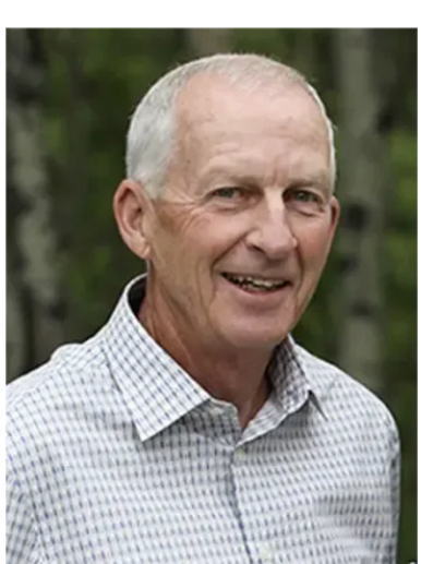 A man smiling with looking on the camera