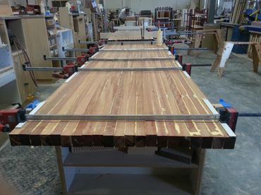 Our building shop for In Edge Grain - Full Length Bar  15'  joining a 13' Wide Walnut Counters