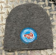 Heather gray knit cap with the first due fishing charters logo embroidered on it.