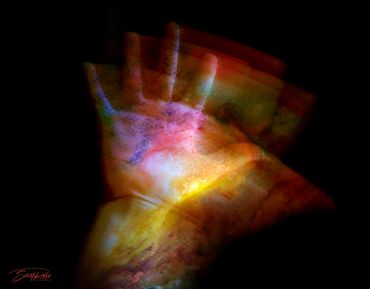 Colorful hand silhouette with a cosmic or nebula-like texture on black background.